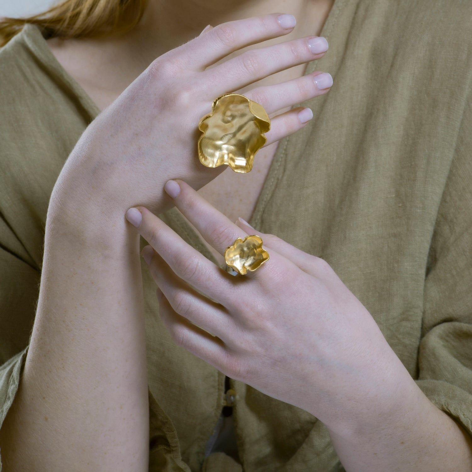 Silver sculptural rings with 2 pods on a knife edge ring band.