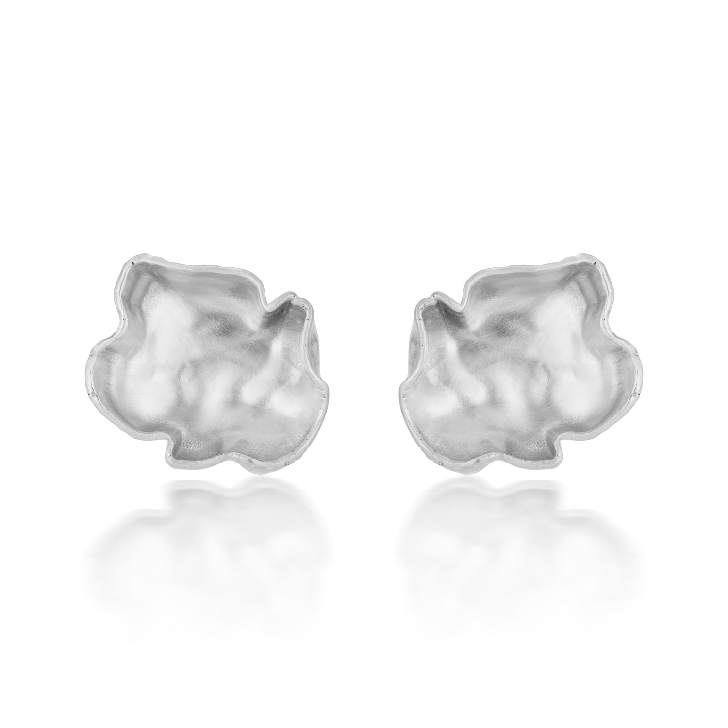 Mushroom cap inspired earrings in silver.