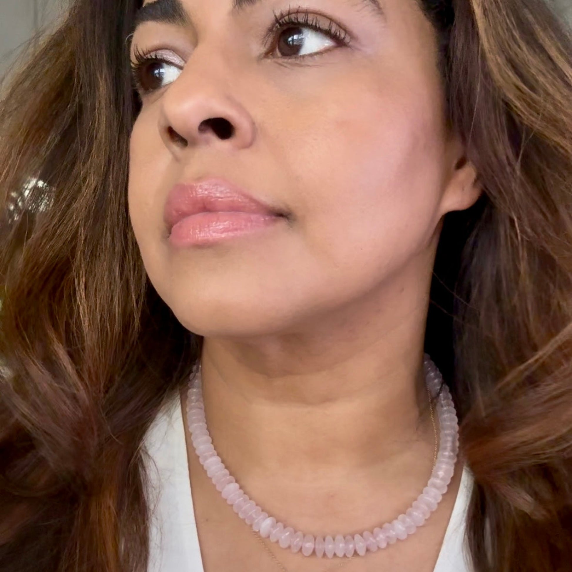 Blush Rose Quartz Rondelle Bead necklace with Flow clasp in Sterling Silver on model 2