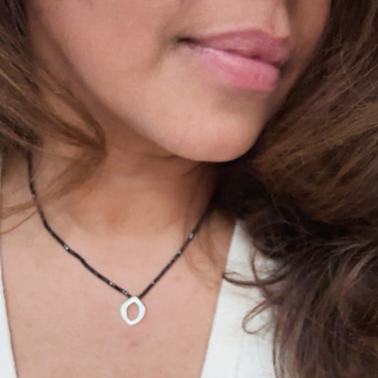 Bud Necklace on a black Spinel strand on Model