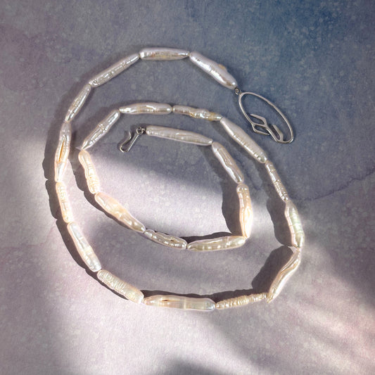 Linear Pearl Necklace with Oval Branch Clasp in Sterling Silver