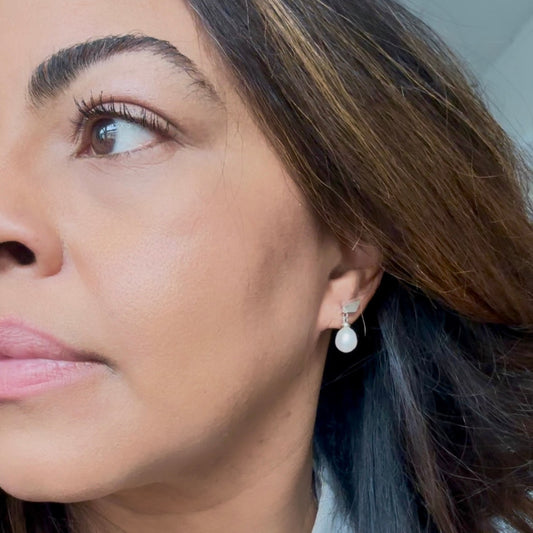 Petite Fyllo Pearl Earrings in Sterling Silver on model