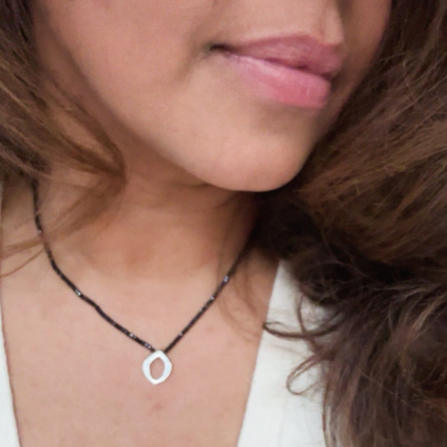 Bud Necklace on a black Spinel strand on Model