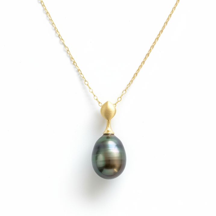 14K brushed gold and dark Tahitian pearl pendant with hidden bail.